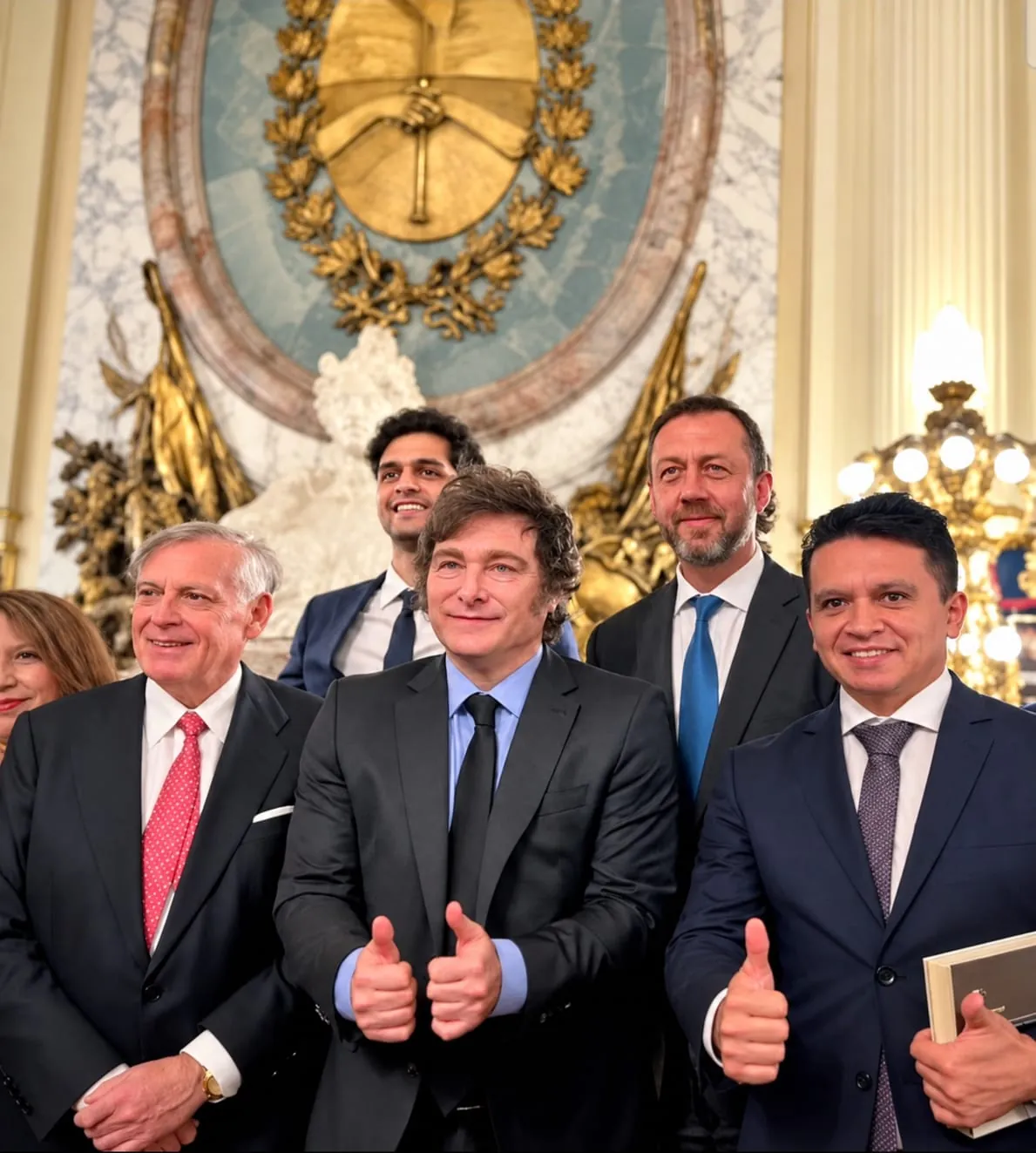 Diego Macana Roa at an official event with Javier Milei and Jesús Huerta de Soto
